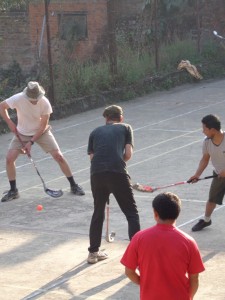 Four people playing sahalu